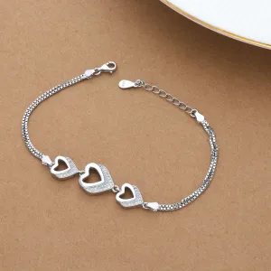 Zircon Studded Heart Interlocked Silver Bracelet